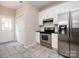 Modern kitchen with stainless steel appliances and white cabinets at 104 Pratt St, Belmont, NC 28012