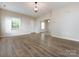 Bright living room with hardwood floors at 104 Pratt St, Belmont, NC 28012