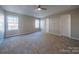 Large main bedroom with carpeted floors and neutral walls at 10502 Haddington Nw Dr, Charlotte, NC 28269