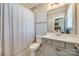 Clean bathroom with shower/tub combo and single vanity at 12014 Grey Partridge Dr, Charlotte, NC 28278