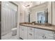 Modern bathroom with double vanity and shower/tub combo at 12014 Grey Partridge Dr, Charlotte, NC 28278