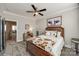 Spacious bedroom with a king-size bed and access to another room at 12014 Grey Partridge Dr, Charlotte, NC 28278