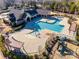 Community pool with a spacious sundeck and playground at 12014 Grey Partridge Dr, Charlotte, NC 28278