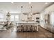 Spacious kitchen with white cabinets, large island, and stainless steel appliances at 12014 Grey Partridge Dr, Charlotte, NC 28278