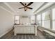 Large main bedroom with a white wooden bed frame and plenty of natural light at 12014 Grey Partridge Dr, Charlotte, NC 28278