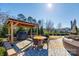 Outdoor patio with dining area and grill at 12014 Grey Partridge Dr, Charlotte, NC 28278