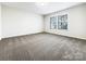 Bright bedroom with neutral walls and carpet flooring at 14916 Oregon Oak Ct, Mint Hill, NC 28227