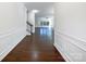 Bright entry hall with hardwood floors and view of the living room at 14916 Oregon Oak Ct, Mint Hill, NC 28227