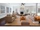 Spacious living room with fireplace and hardwood floors, virtually staged at 14916 Oregon Oak Ct, Mint Hill, NC 28227