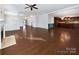 Open living room with hardwood floors and fireplace at 14916 Oregon Oak Ct, Mint Hill, NC 28227