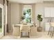 Bright dining room with a round table and beige chairs at 1811 Otter Perch Ln, Fort Mill, SC 29715