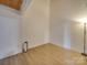 Simple bedroom with hardwood floors and white walls at 201 S Hoskins Rd # 122, Charlotte, NC 28208