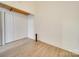 Spacious bedroom with double doors and hardwood floors at 201 S Hoskins Rd # 122, Charlotte, NC 28208