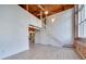 Spacious living area with exposed beams and loft view at 201 S Hoskins Rd # 122, Charlotte, NC 28208