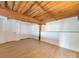 Spacious loft bedroom with exposed wooden beams at 201 S Hoskins Rd # 122, Charlotte, NC 28208