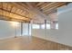 Loft area with exposed beams and brick walls at 201 S Hoskins Rd # 122, Charlotte, NC 28208