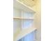 White shelving unit with ample storage space at 201 S Hoskins Rd # 122, Charlotte, NC 28208