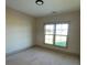 Spacious bedroom with large window and neutral walls at 226 Beths Ct, York, SC 29745