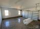 Spacious garage with overhead door and concrete floor at 226 Beths Ct, York, SC 29745