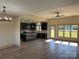 Modern kitchen with dark cabinets, granite countertops, and an island at 226 Beths Ct, York, SC 29745