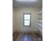 Bright pantry with ample shelving and wood flooring at 226 Beths Ct, York, SC 29745