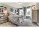 Charming bedroom with decorative accents and large windows at 3226 Mcharney Dr # 35, Harrisburg, NC 28075