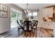 Bright dining area with table and chairs near sliding door at 3226 Mcharney Dr # 35, Harrisburg, NC 28075