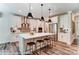 Modern kitchen with island, stainless steel appliances, and white cabinets at 3226 Mcharney Dr # 35, Harrisburg, NC 28075