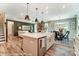 Modern kitchen with island and open-concept layout at 3226 Mcharney Dr # 35, Harrisburg, NC 28075