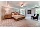 Main bedroom with large bed and neutral color palette at 3226 Mcharney Dr # 35, Harrisburg, NC 28075