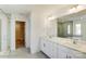 Double vanity bathroom with a large mirror and separate shower and tub at 3229 Mcharney Dr # 35, Harrisburg, NC 28075