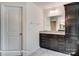 Bathroom features dark brown vanity and granite countertop at 3229 Mcharney Dr # 35, Harrisburg, NC 28075