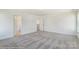 Spacious bedroom with access to a bathroom and hallway at 3229 Mcharney Dr # 35, Harrisburg, NC 28075