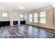 Spacious Gathering room with fireplace and built-in shelving at 3229 Mcharney Dr # 35, Harrisburg, NC 28075