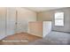 Open loft area with neutral carpet at 3229 Mcharney Dr # 35, Harrisburg, NC 28075