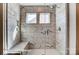 Spacious shower with marble tile and glass enclosure at 3229 Mcharney Dr # 35, Harrisburg, NC 28075