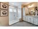 Modern bathroom with white cabinets, a large shower, and double vanity at 3237 Mcharney Dr # 29, Harrisburg, NC 28075