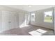 Bedroom with double doors and large windows at 3237 Mcharney Dr # 29, Harrisburg, NC 28075