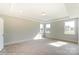 Bright bedroom with carpet and natural light at 3237 Mcharney Dr # 29, Harrisburg, NC 28075