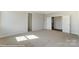 Spacious bedroom with carpet and double doors to other rooms at 3237 Mcharney Dr # 29, Harrisburg, NC 28075