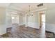 Elegant dining room with hardwood floors and chandelier at 3237 Mcharney Dr # 29, Harrisburg, NC 28075