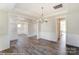 Elegant dining room with hardwood floors and chandelier at 3237 Mcharney Dr # 29, Harrisburg, NC 28075