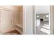 Bright entryway with built-in bench seating and view to living area at 3237 Mcharney Dr # 29, Harrisburg, NC 28075