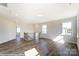 Spacious loft area with hardwood flooring and balcony at 3237 Mcharney Dr # 29, Harrisburg, NC 28075