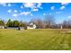 Large backyard with shed and partial view of house at 415 Cameron Dr, Salisbury, NC 28147