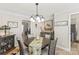 Dining room with table, chairs, and view into kitchen at 415 Cameron Dr, Salisbury, NC 28147