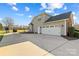 Two-car garage with large driveway at 415 Cameron Dr, Salisbury, NC 28147