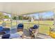 Relaxing screened porch with wicker chairs at 415 Cameron Dr, Salisbury, NC 28147