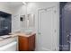 Modern bathroom boasts double sinks, a walk-in shower, and a toilet at 420 Queens Rd # 6, Charlotte, NC 28207