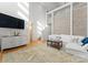 Open living space with lofted area and fireplace at 420 Queens Rd # 6, Charlotte, NC 28207